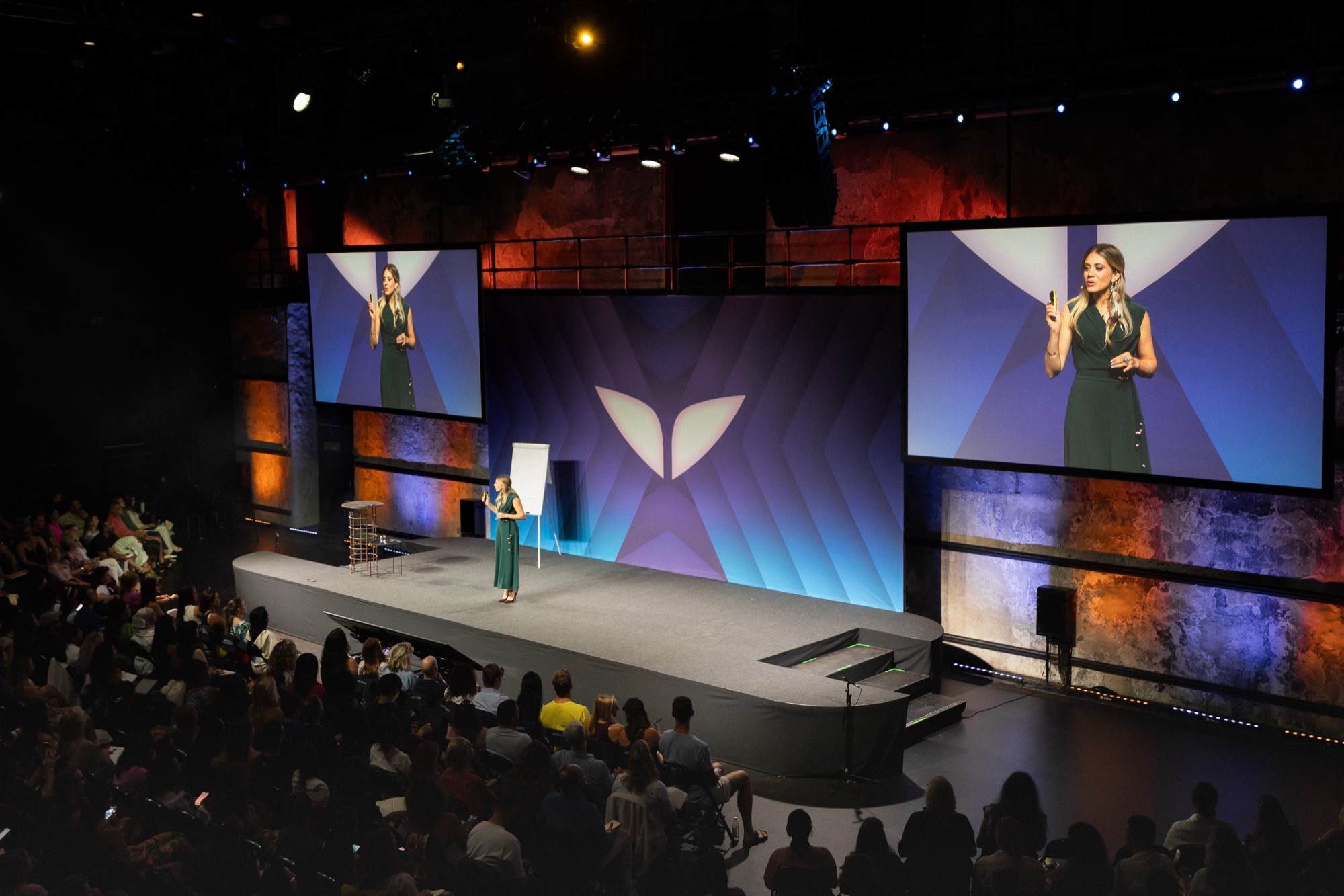 Sabrina Stocker speaking on stage